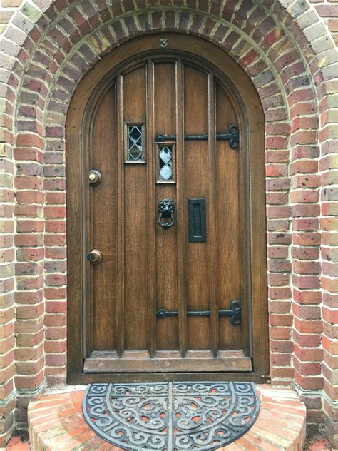 tudor style entry doors.